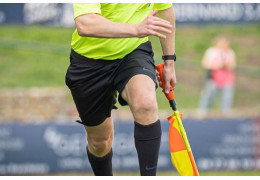 What are the advantages of electronic flags for sports referees?